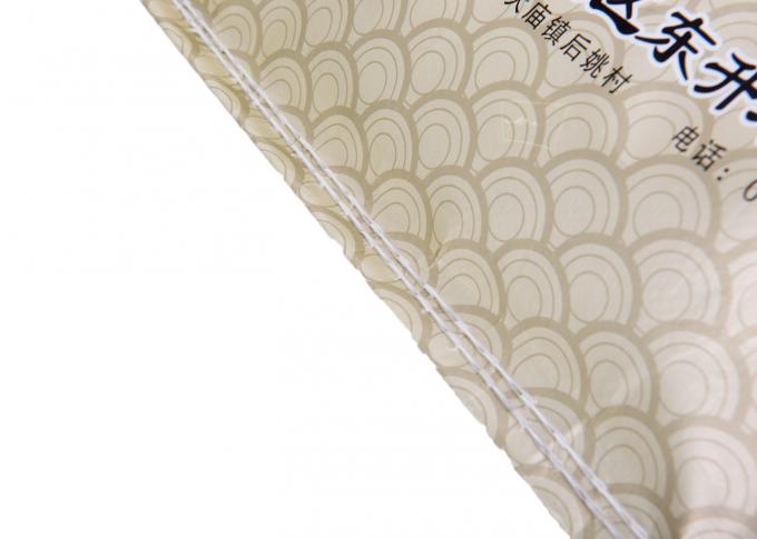 Rosque los bolsos de empaquetado tejidos los PP de costura del arroz con el fotograbado que imprime el escudete lateral de los 4.4cm